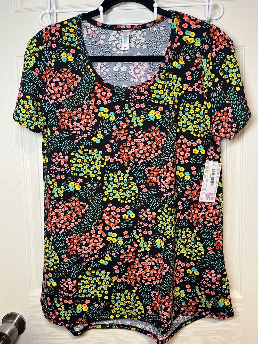 LuLaRoe Black Scoop Neck Tee with Pink, Yellow & Coral Floral Print